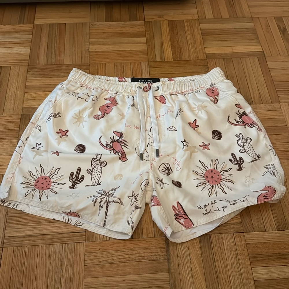 Native youth swim trunks